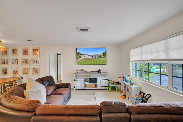 7735 Edgewater Dr, Lake Clarke Shores, FL 33406 - living room with wood finished floors