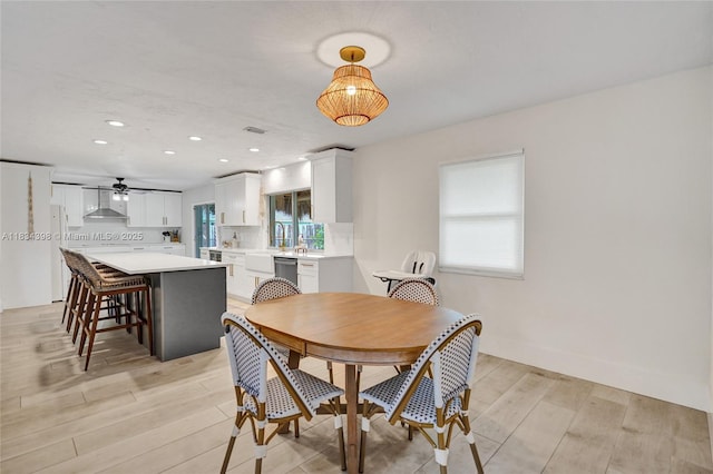 7735 Edgewater Dr, Lake Clarke Shores, FL 33406 - dining room featuring light wood-style floors, recessed lighting, and ceiling fan