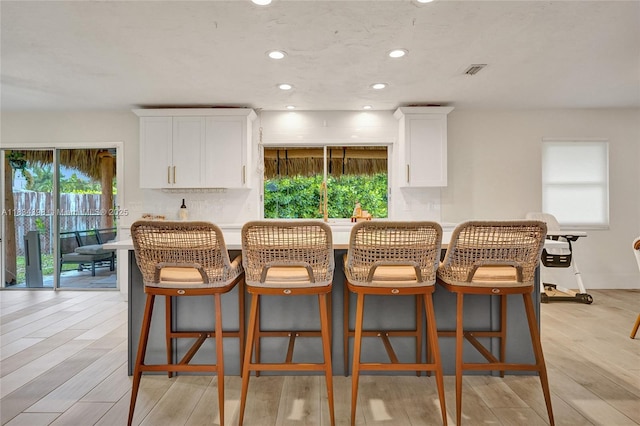 7735 Edgewater Dr, Lake Clarke Shores, FL 33406 - dining room featuring recessed lighting and light wood finished floors