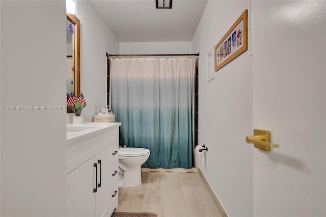 7735 Edgewater Dr, Lake Clarke Shores, FL 33406 - bathroom featuring vanity and wood finished floors