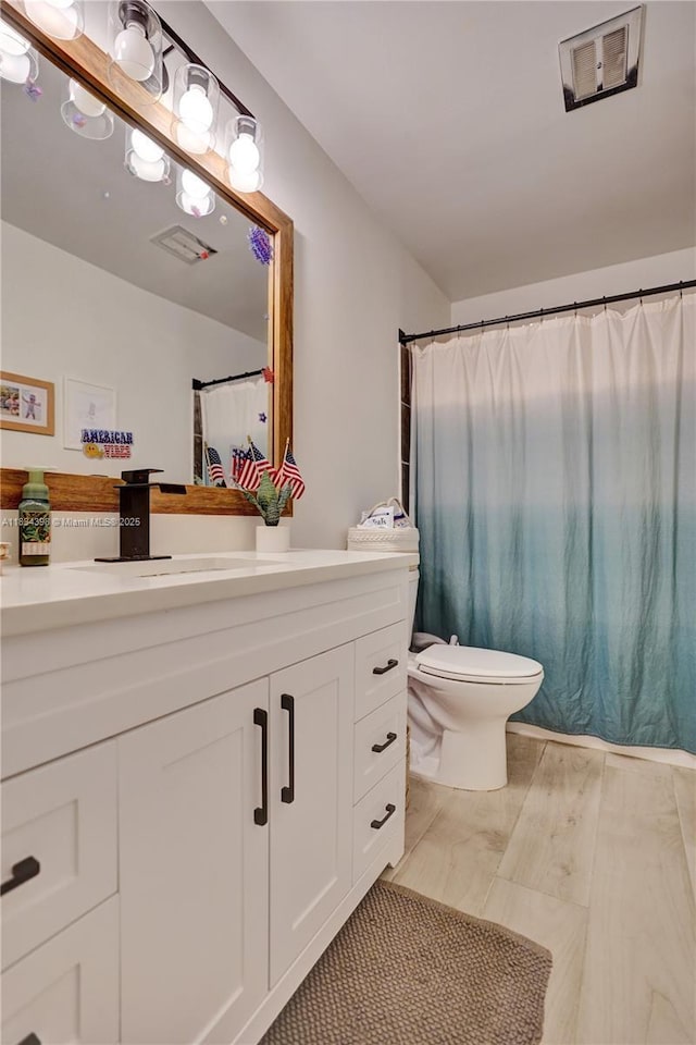 7735 Edgewater Dr, Lake Clarke Shores, FL 33406 - full bathroom with vanity and toilet