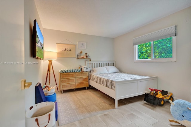 7735 Edgewater Dr, Lake Clarke Shores, FL 33406 - bedroom with wood finished floors