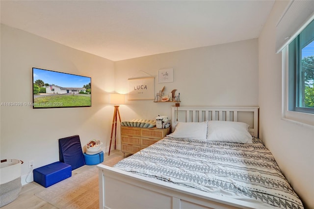7735 Edgewater Dr, Lake Clarke Shores, FL 33406 - bedroom featuring wood finished floors