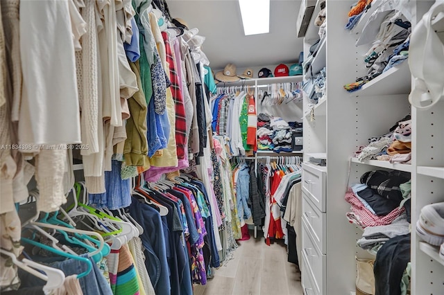 7735 Edgewater Dr, Lake Clarke Shores, FL 33406 - walk in closet with light wood finished floors