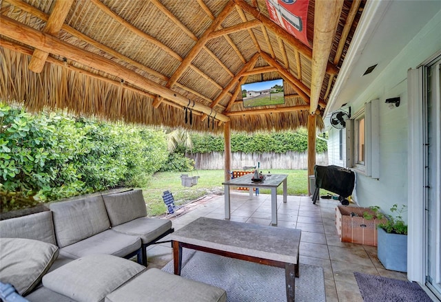 7735 Edgewater Dr, Lake Clarke Shores, FL 33406 - fenced backyard with outdoor lounge area, a gazebo, and a patio area