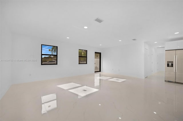 324 SW 16th Ter, Homestead, FL 33030 - spare room with recessed lighting and light marble finish flooring