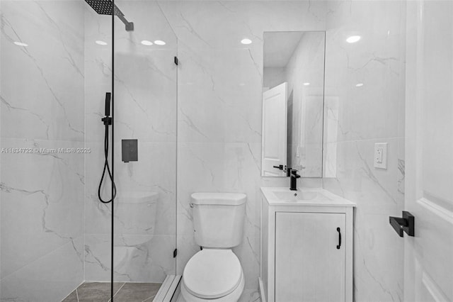 324 SW 16th Ter, Homestead, FL 33030 - full bathroom featuring tile walls, a marble finish shower, and vanity