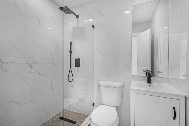 324 SW 16th Ter, Homestead, FL 33030 - full bath featuring vanity, tile walls, and a marble finish shower