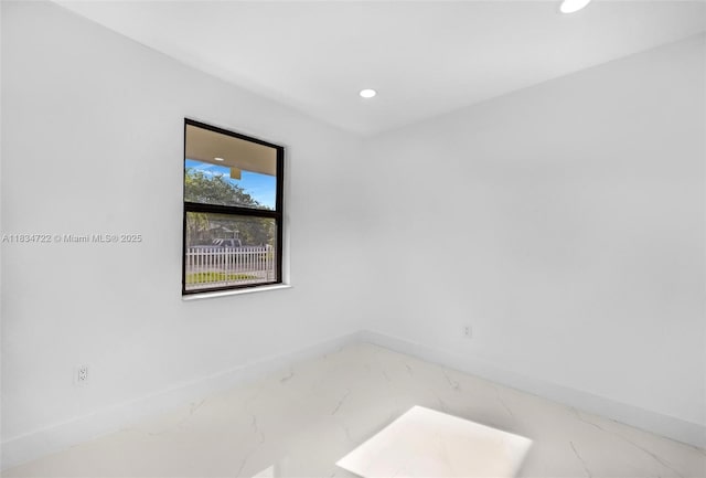 324 SW 16th Ter, Homestead, FL 33030 - unfurnished room featuring marble finish flooring and recessed lighting