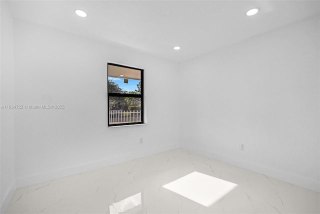 324 SW 16th Ter, Homestead, FL 33030 - empty room featuring marble tiled flooring and recessed lighting