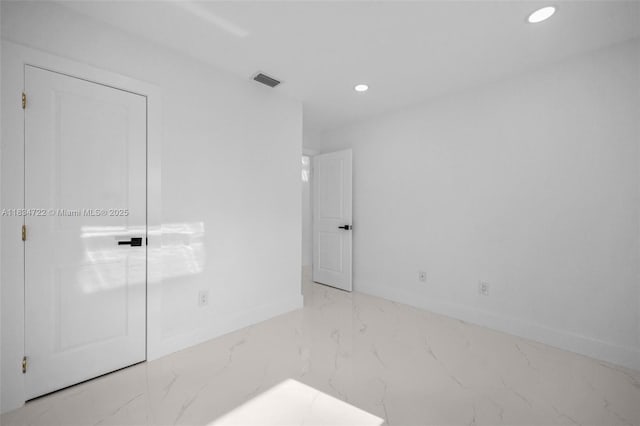 324 SW 16th Ter, Homestead, FL 33030 - unfurnished room featuring marble finish floors and recessed lighting