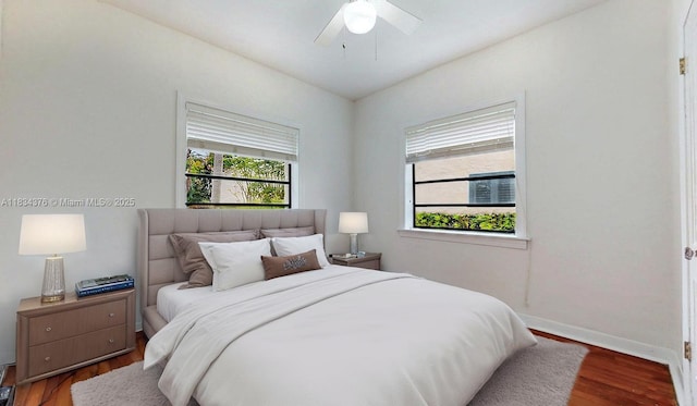 1111 Columbus Blvd, Coral Gables, FL 33134 - bedroom with wood finished floors and a ceiling fan