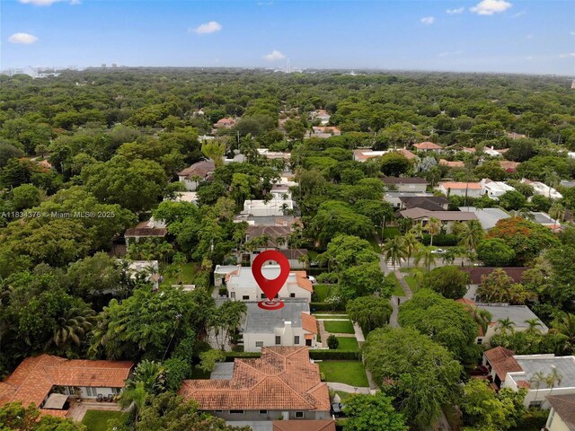 1111 Columbus Blvd, Coral Gables, FL 33134 - aerial perspective of suburban area with a heavily wooded area