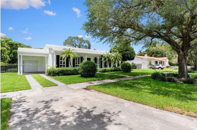 45 NE 104th St, Miami Shores, FL 33138 - ranch-style home featuring driveway, an attached garage, and stucco siding