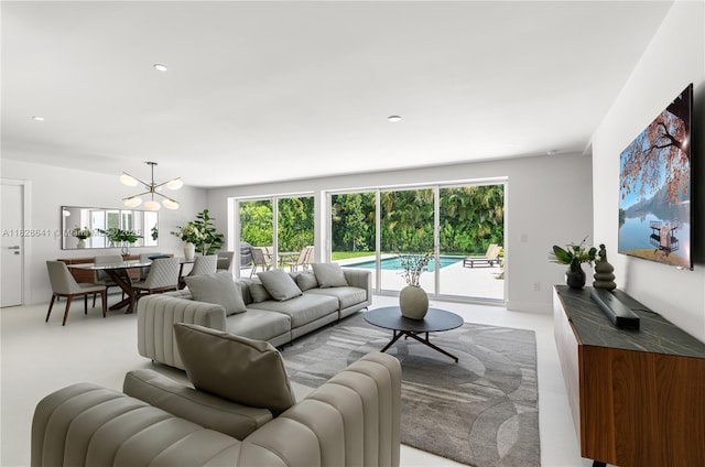 45 NE 104th St, Miami Shores, FL 33138 - living room with a chandelier and recessed lighting