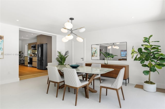 45 NE 104th St, Miami Shores, FL 33138 - dining room featuring a chandelier
