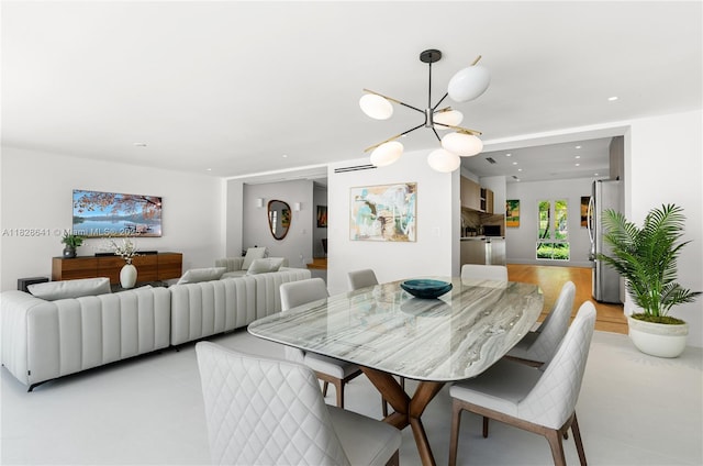 45 NE 104th St, Miami Shores, FL 33138 - dining room featuring a chandelier and recessed lighting