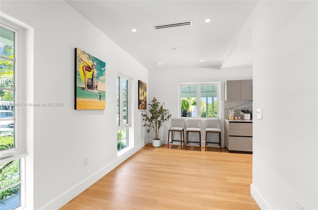 45 NE 104th St, Miami Shores, FL 33138 - corridor with light wood finished floors and recessed lighting