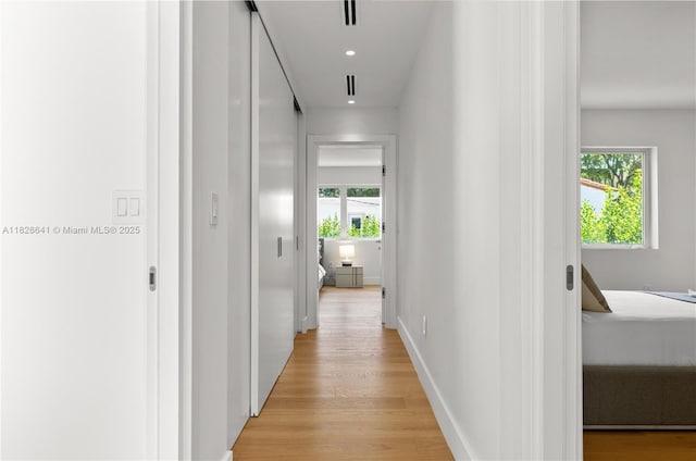 45 NE 104th St, Miami Shores, FL 33138 - hall with light wood-type flooring and recessed lighting