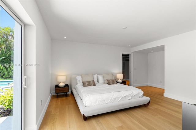 45 NE 104th St, Miami Shores, FL 33138 - bedroom featuring light wood finished floors and recessed lighting