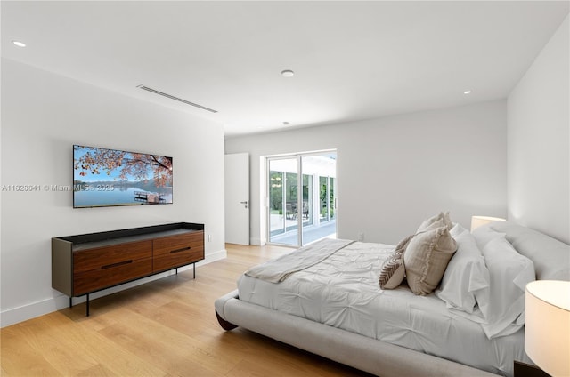 45 NE 104th St, Miami Shores, FL 33138 - bedroom featuring access to outside, light wood-style flooring, and recessed lighting