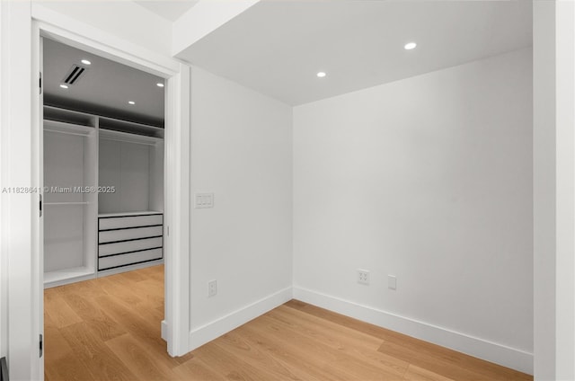 45 NE 104th St, Miami Shores, FL 33138 - unfurnished bedroom featuring light wood finished floors, a closet, and recessed lighting