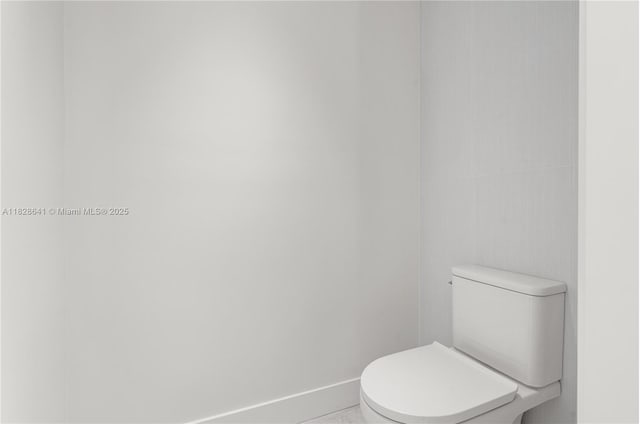 45 NE 104th St, Miami Shores, FL 33138 - bathroom with toilet and baseboards