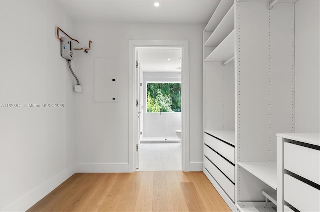 45 NE 104th St, Miami Shores, FL 33138 - walk in closet featuring light wood finished floors and electric panel