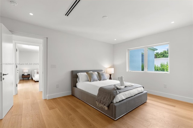 45 NE 104th St, Miami Shores, FL 33138 - bedroom with light wood finished floors and recessed lighting