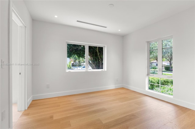 45 NE 104th St, Miami Shores, FL 33138 - unfurnished room featuring light wood finished floors and recessed lighting