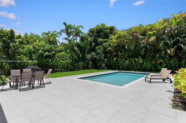45 NE 104th St, Miami Shores, FL 33138 - swimming pool featuring a patio and outdoor dining space