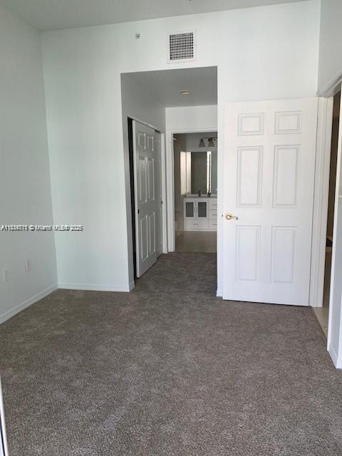 1209 Main St Unit 215, Jupiter, FL 33458 - carpeted spare room with baseboards