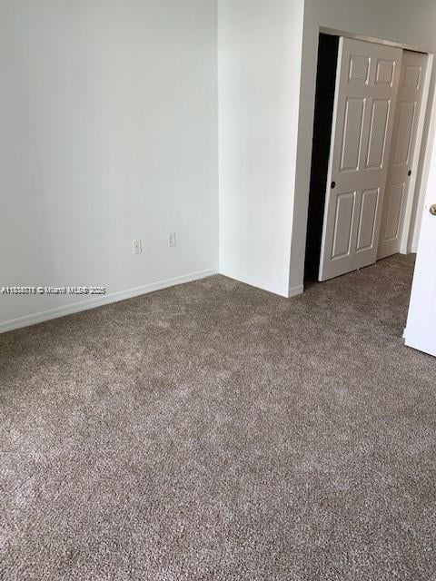 1209 Main St Unit 215, Jupiter, FL 33458 - empty room featuring carpet floors