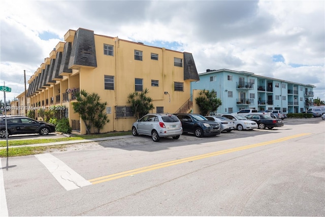 3494 E 4th Ave Unit 1207, Hialeah, FL 33013 - view of apartment building / complex featuring uncovered parking