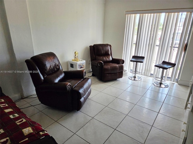 3494 E 4th Ave Unit 1207, Hialeah, FL 33013 - sitting room with light tile patterned floors