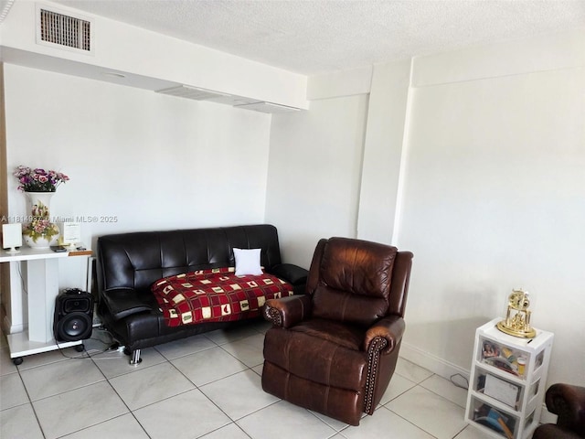 3494 E 4th Ave Unit 1207, Hialeah, FL 33013 - sitting room featuring tile patterned floors and a textured ceiling