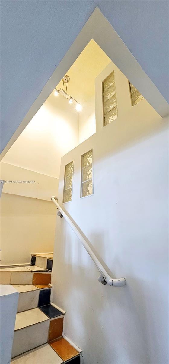 3494 E 4th Ave Unit 1207, Hialeah, FL 33013 - staircase featuring track lighting