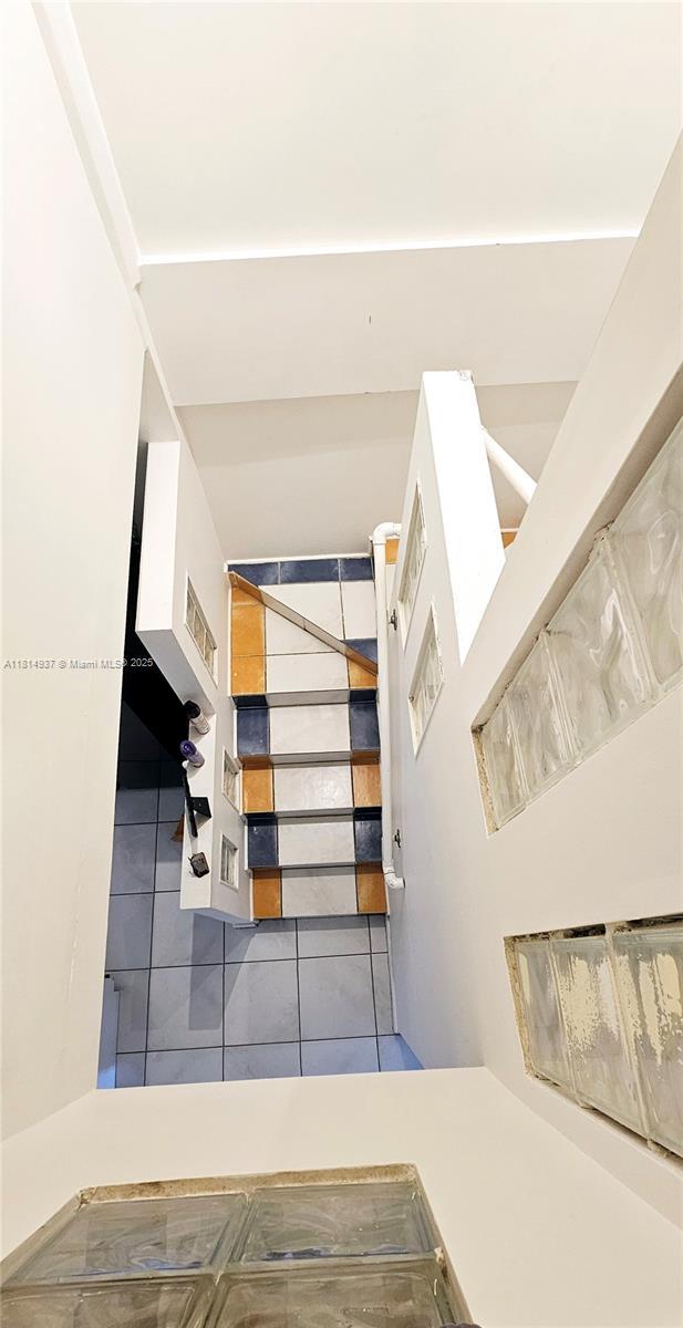 3494 E 4th Ave Unit 1207, Hialeah, FL 33013 - bathroom featuring tile patterned flooring