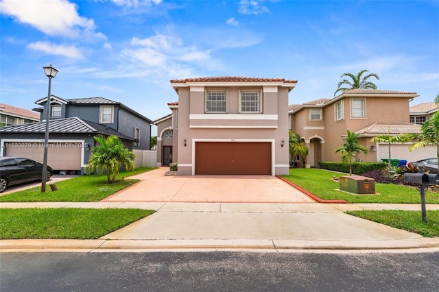 1894 SW 149th Ave, Miramar, FL 33027 - view of front of house featuring stucco siding, driveway, an attached garage, and a front lawn