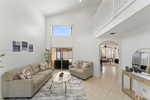1894 SW 149th Ave, Miramar, FL 33027 - living room with high vaulted ceiling, light tile patterned flooring, arched walkways, plenty of natural light, and ceiling fan