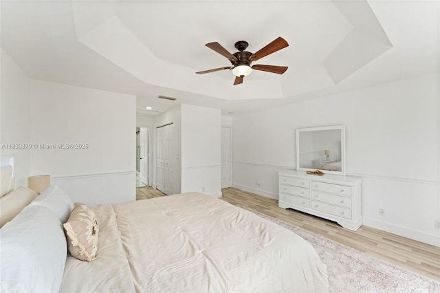 1894 SW 149th Ave, Miramar, FL 33027 - bedroom with a tray ceiling, light wood-style flooring, recessed lighting, and ceiling fan