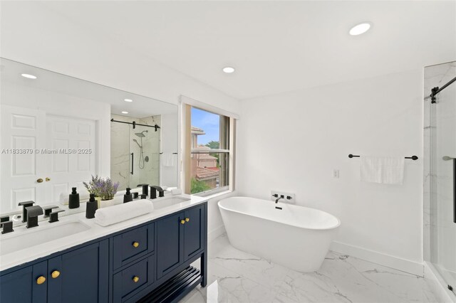 1894 SW 149th Ave, Miramar, FL 33027 - bathroom with a marble finish shower, double vanity, a freestanding tub, recessed lighting, and marble look tiles