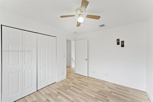 1894 SW 149th Ave, Miramar, FL 33027 - unfurnished bedroom featuring light wood-style floors, a closet, and a ceiling fan