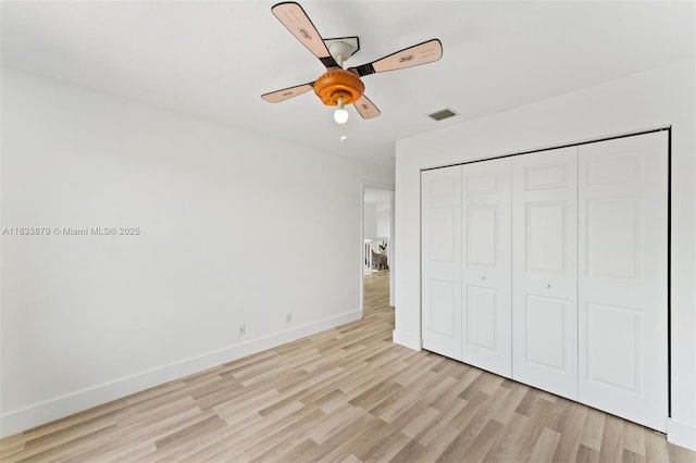 1894 SW 149th Ave, Miramar, FL 33027 - unfurnished bedroom with light wood-style floors, a closet, and a ceiling fan