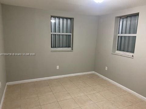 1770 NW 44th St, Miami, FL 33142 - empty room featuring baseboards