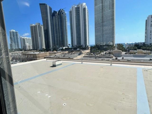 16909 N Bay Rd Unit 319, Sunny Isles Beach, FL 33160 - exterior space with a skyline view