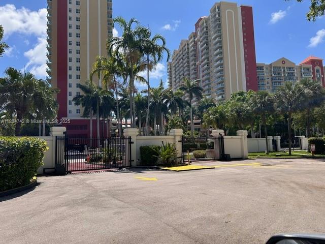 16909 N Bay Rd Unit 319, Sunny Isles Beach, FL 33160 - view of property featuring uncovered parking