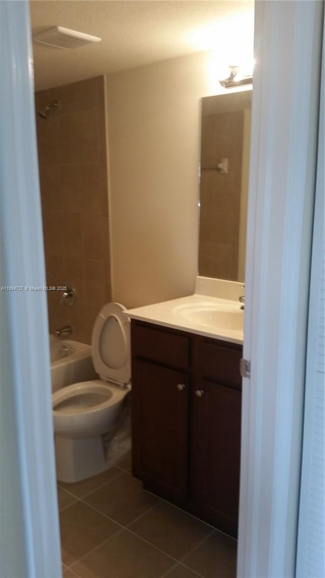 22441 SW 88th Pl Unit 204-5, Cutler Bay, FL 33190 - bathroom featuring tile patterned floors, vanity, and bathing tub / shower combination