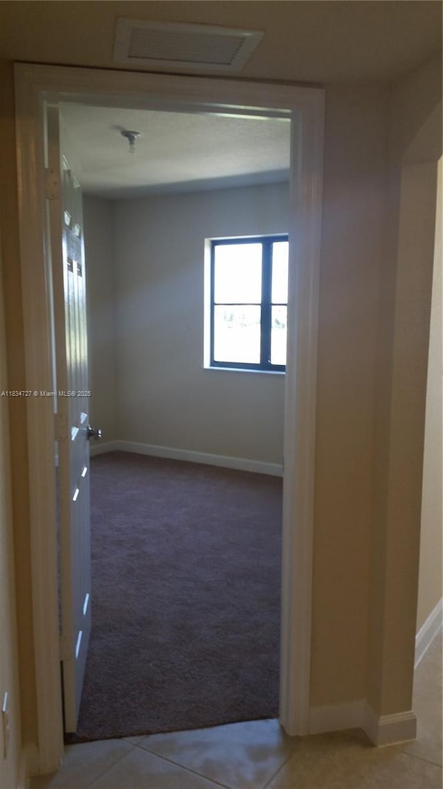 22441 SW 88th Pl Unit 204-5, Cutler Bay, FL 33190 - carpeted spare room featuring baseboards and attic access