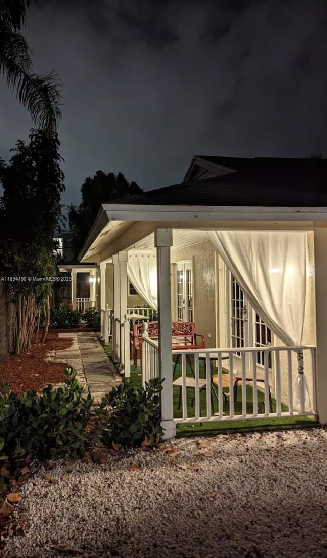 view of home's exterior featuring french doors